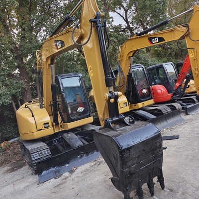 Самый низкий экскаватор Caterpillar 308C с подержанными кроссовками и рабочей массой 8000 кг