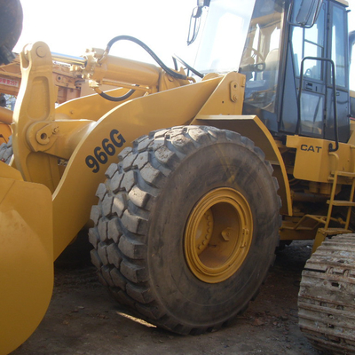 Использованный загрузчик передних колес Caterpillar 966G с 1200 рабочими часами и мощностью 92 кВт