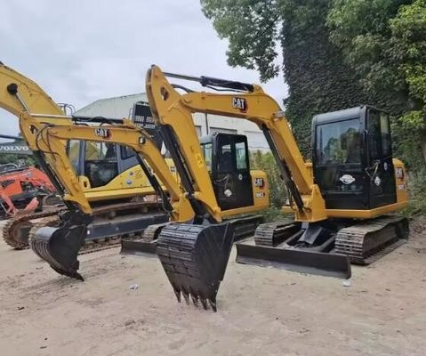 Экскаватор Caterpillar CAT306E2 с вместимостью 0,31 ведра и массой машины 6800 кг